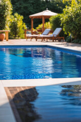 Fototapeta premium Luxurious outdoor swimming pool with loungers in sunny garden retreat setting