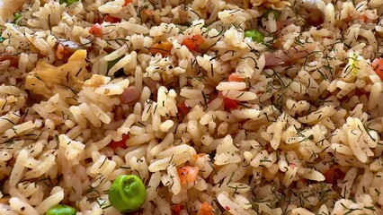 Enjoy this delicious vegetable rice dish, perfectly cooked with fresh herbs for flavor