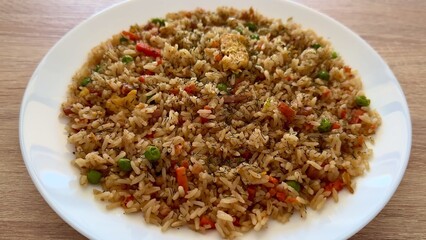 Enjoy a Plate of Delicious and Flavorful Vegetable Fried Rice, Perfect for Any Meal