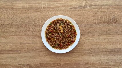 An exquisite and colorful Vegetable Fried Rice dish that is both delicious and nutritious
