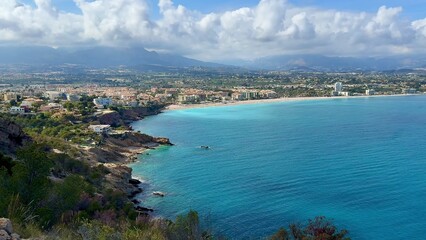 A stunning coastal view with turquoise waters and scenic landscape, ideal for relaxation
