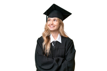 Young university English graduate woman over isolated background looking up while smiling