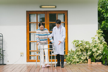 Fototapeta premium Doctor Assisting Senior Woman with Walker