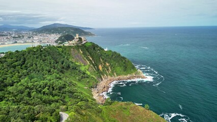 Stunning Aerial View Showcasing a Beautiful Coastal Landscape with a Prominent Hilltop Structure