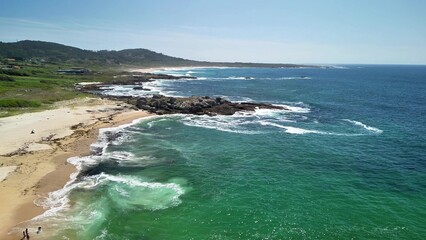 An Idyllic Coastal Landscape Features Beautiful Turquoise Waters and a Rocky Shoreline