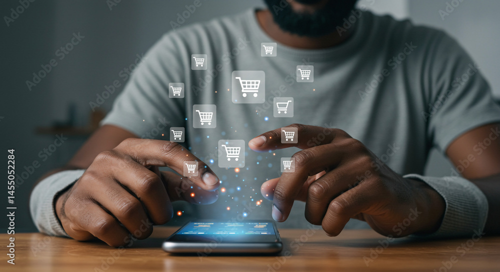 Poster person using smartphone with shopping cart icons hovering above the screen on a wooden table