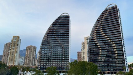 Fototapeta premium Modern Architectural Skyscrapers Majestically Rising in an Urban Landscape During Sunset
