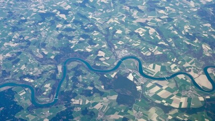 Stunning Aerial Viewcapturing a Winding River Surrounded by Lush Agricultural Fields