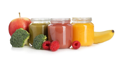 Baby food. Tasty puree in jars and ingredients on white background