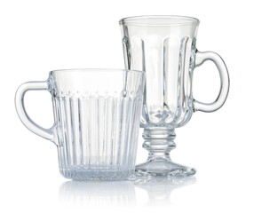 Different empty clean glasses isolated on white