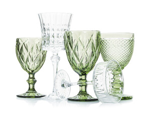 Different empty clean glasses isolated on white