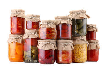 Many jars with different pickled products isolated on white