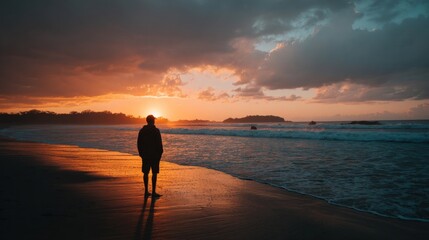 Lone Traveler Embraces the Magic of a Vivid Beach Sunset