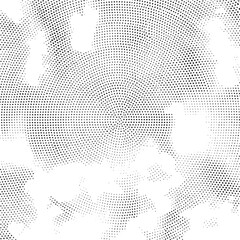 A black and white abstract of countless small dots creates a dynamic textured surface.