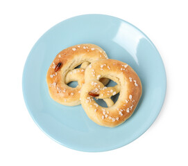 Cockroaches crawling on salted pretzels against white background, top view