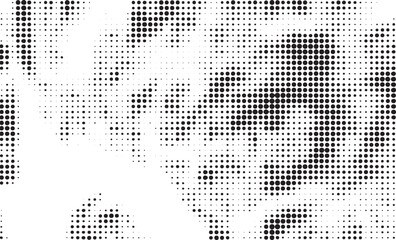 A grayscale portrait showcases a blurred face formed by numerous small dots.