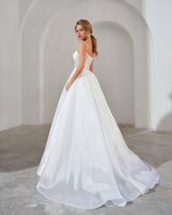 Fototapeta premium Elegant Bride in White Wedding Dress..