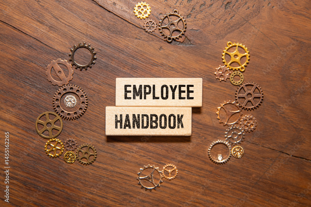 Aufkleber employee handbook text concept write on notebook