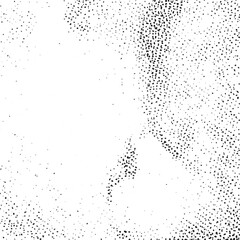 Obraz premium A blurred textured abstract formation of white dots against a dark background.