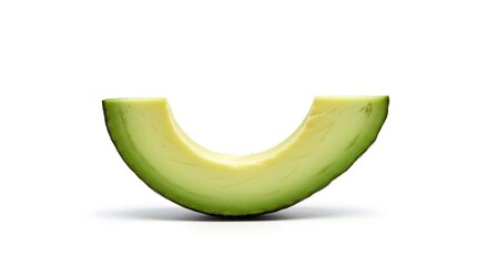 Clean avocado slice standing upright on white background.