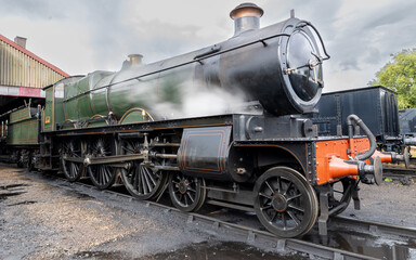 Steam locomotive awaiting its tasking at the engine shed.