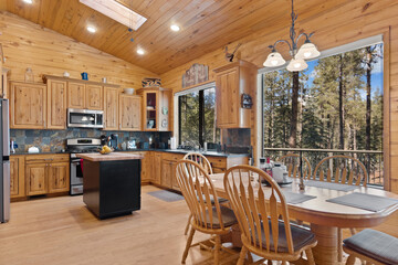 A cozy kitchen and dining area in a charming log cabin