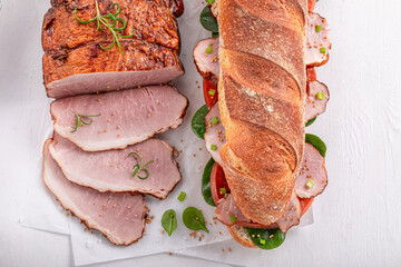 Fresh and tasty sandwich with ham, tomato and lettuce.