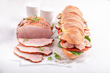 Healthy and fresh sandwich with ham, tomato and lettuce.