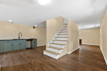 In the center of the room, there is a staircase that stands prominently