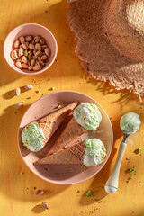 Tasty and homemade pistachio ice cream made of green nuts.