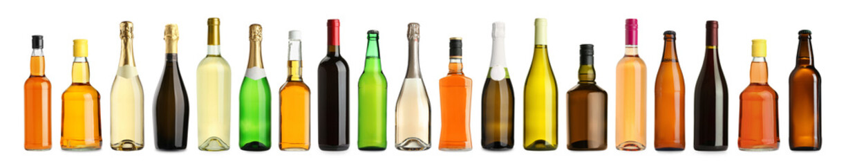 Bottles with different types of alcoholic drinks isolated on white, set