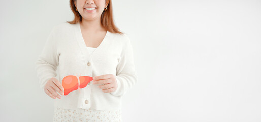  woman holding healthy liver, organ donation, hepatitis vaccination, liver cancer treatment, world...