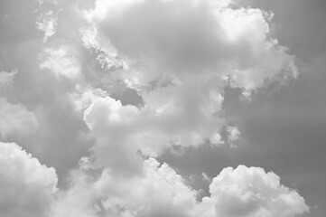 Gray sky with white clouds. Beautiful sky background and wallpaper. Concept Storm Clouds Raining.