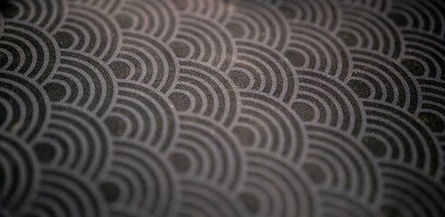 Intricate black wave pattern background design