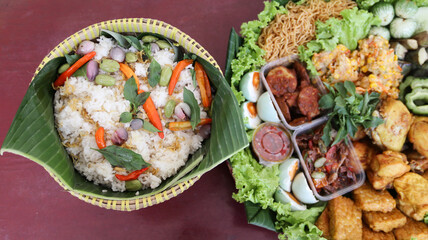 Nasi Liwet Sunda from West Java with its unique Sundanese cuisine a different taste and presentation from Sundanese eating tradition called ngeliwet or botram
