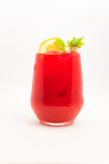 vibrant red berry cocktail with orange slice and fresh mint leaves served in clear glass with ice...