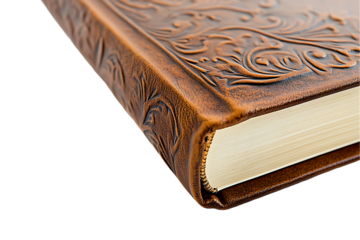 Embossed Leather Journal: Close-up of Brown Cover with Floral Motif and Cream Pages on White.