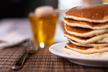 Pancake breakfast with honey and granola