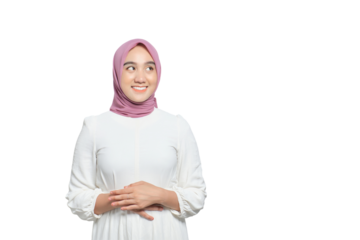 Portrait of young Asian Muslim woman keeping both hands on belly, feeling hungry and wanting to eat delicious isolated on transparent background