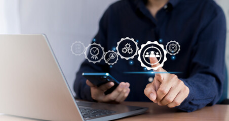 Business marketing position concept, businessman holds dart board icon with arrows for customer target group.	