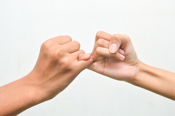 promise hand as friendship or love concept isolated on white background