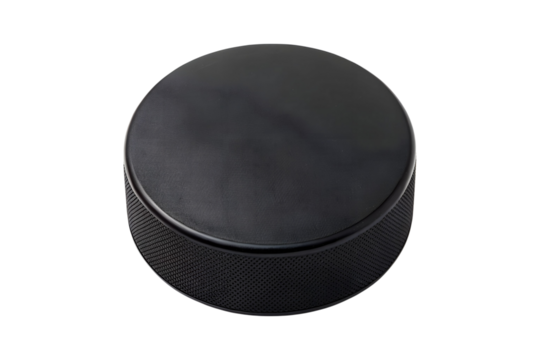 A closeup studio shot of a professional black ice hockey puck transparent background