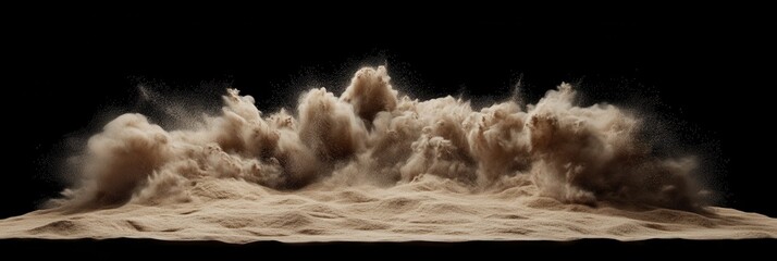 A massive cloud of sand erupts from a flat, sandy plain