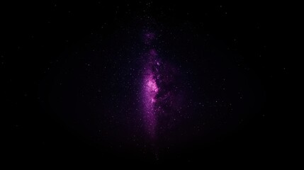 Obraz premium A glowing, pink nebula shines in the center of a star-filled, dark night sky, evoking the mystery of deep space.