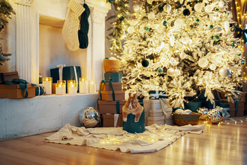 New Year's interior, fireplace, candles, tree with gifts. Merry Christmas.