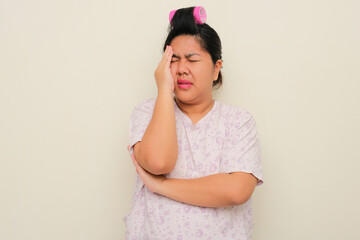 An asian housewife showing stressed expression