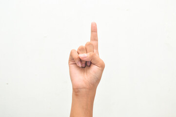 Young man's hand showing the number one isolated on a white background. Counting concept