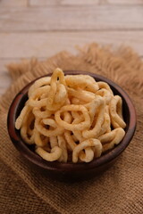 Lanthing or klanthing is a snack like crackers made from cassava dough. Indonesian food. Lanting.