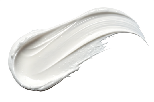 A creamy white swirl of lotion or moisturizer against a stark black background in a studio shot