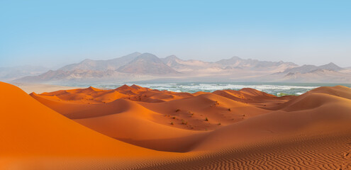 Sahara desert with Atlantic ocean meets near coast - Morocco, North Africa